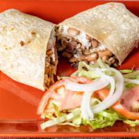 Burrito · Chicken or beef with rice, beans and sour cream.