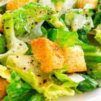 Caesar Salad · Romaine Hearts, Croutons Parmesan Cheese and Caesar Dressing