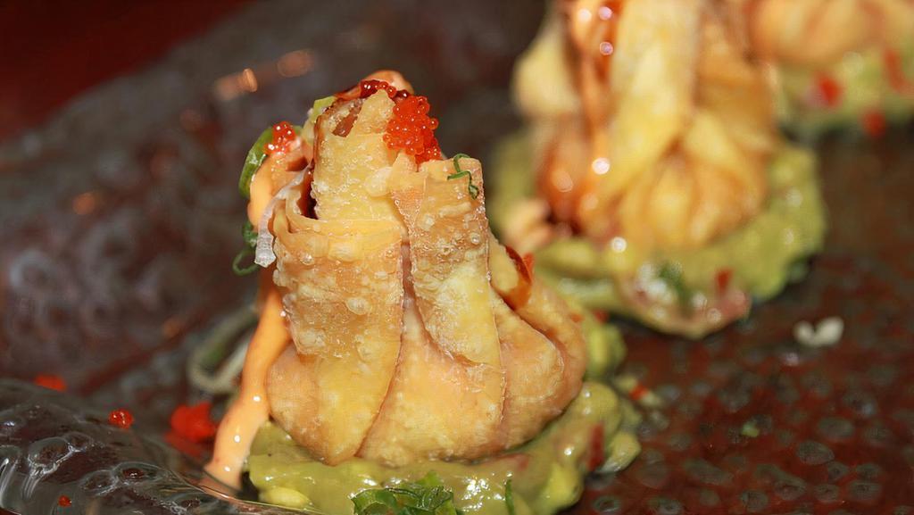 As10. Spicy Tuna Gyoza · Spicy tuna wrapped with wonton wrapper, fried, served with eel sauce & spicy mayo.