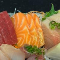 Sashimi Dinner · Sixteen pieces of assorted fish.