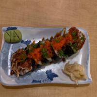 Spider Roll* · Deep fried soft-shell crab, red tobiko, cucumber, kaiware, and gobo (6pc)