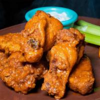 Hot Wings · Buffalo style. chicken wings served with blue Cheese.