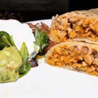 Chicken Burrito · Hand-prepared flour tortilla with Cheese, red rice, pinto beans, chicken, sour cream and gua...