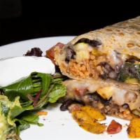 Veggie Burrito · Hand-prepared flour tortilla with veggies, cheese, red rice, black beans, onions, pepper, zu...