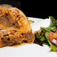 Beef Burrito · Hand-prepared flour tortilla with beef, cheese, red rice, pinto beans, sour cream and guacam...