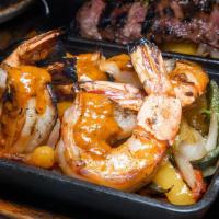 Shrimp Fajitas · Roasted peppers and onions, corn tortillas, pico de gallo, guacamole, Cheese, sour cream, ri...
