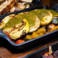 Veggie Fajitas · Roasted peppers and onions, corn tortillas, pico de gallo, guacamole, Cheese, sour cream, ri...