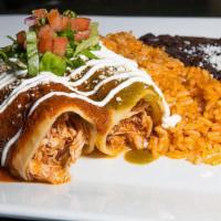 Chicken Enchiladas · Soft corn tortillas stuffed with chicken topped with red chili pepper and tomatillo sauce so...