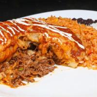 Beef Chimichanga · Deep-fried burrito filled with beef topped with Cheese, sour cream, pico de gallo, tomato or...