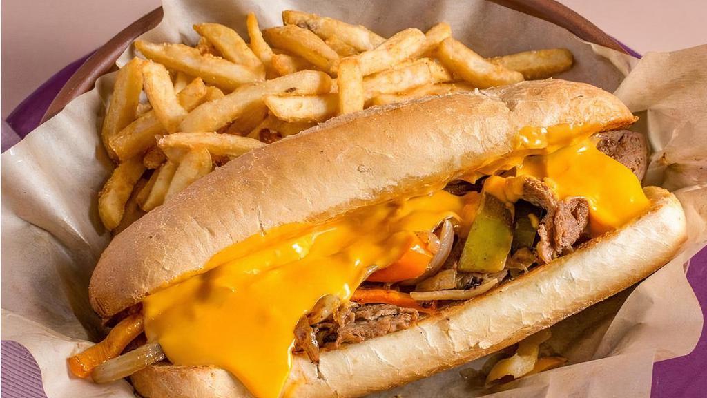 Philly Cheesesteak · Melted cheese, shaved ribeye steak, sauteed peppers and onions on a club roll. Served with Fries