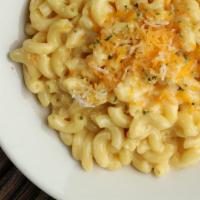 Classic Mac Bowl · Our homemade Mac N Cheese with shredded cheddar cheese and parsley
