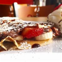 Crazy Crepe · Melted Nutella, sliced bananas and fresh strawberries