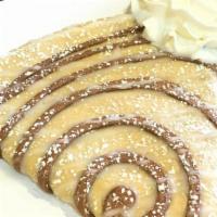 Cinnamon Roll Crepe · Melted home made sweet cream and cinnamon sugar in a cinnamon sugar swirled crepe