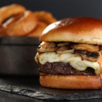 Truffle Burger · Melt sauce, pepper jack cheese, and mushrooms sauteed in truffle butter. Served with fries