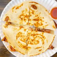 Jack Cheese With Chicken Quesadilla · Made with two fresh flour tortillas stuck together with melted cheese.