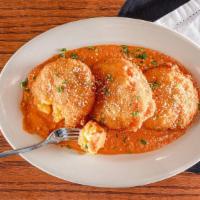 Fried Mac & Cheese · Breaded and fried, served with vodka sauce.