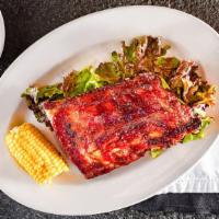 Jim Beam Bbq Baby Back Ribs · Tender, slow-roasted baby back ribs with our signature Jim beam bbq sauce, served with coles...