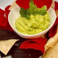 Guac & Chips · tomatoes, scallions, cilantro, red onion, jalapeño, lime.