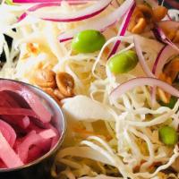 Napa Salad · shredded napa cabbage, romaine, carrots, onions, edamame, peanuts, crispy wonton, korean pep...