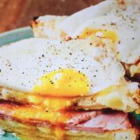 Croque Madame (With Egg) · White toasts, ham, swiss cheese.