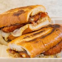 Othello Bad Boy Super Hero · Chicken cutlet with bacon, Swiss, caramelized onions and brown gravy on a garlic hero.