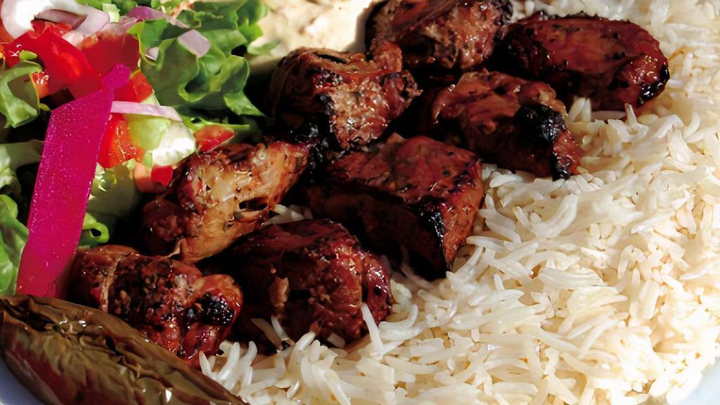 Lamb Shish Kebab · Chunks of lamb with marinated in our special sauce and over charcoal.