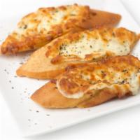 Garlic Bread · Toasty bread with lots of fresh garlic and our house herbs and seasonings.