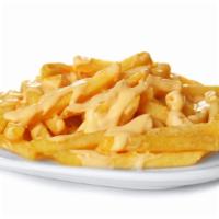 Cheese Fries · Golden, crispy, perfectly seasoned fries smothered with melty cheese.