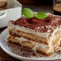 Tiramisu · Light and airy dessert of lady fingers dipped in espresso and layered with creamy mascarpone...