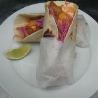 Shrimp Tacos · Two sauteed shrimp and pineapple served on a flour tortilla.