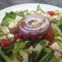 Greek Salad · Lettuce, tomatoes, cucumbers, olive oil, kalamata olives and feta cheese. Add chicken or shr...