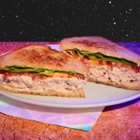 Tuna Salad Sandwich · Tuna salad, lettuce, tomato, your choice of bread.