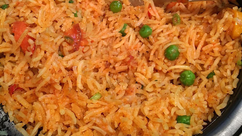 Veg Biryani · Vegetables cooked with rice flavored with spices.