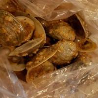 Clams (1 Lb.) · Choice of sauce and spicy level. 2 lb. of the same seafood the item comes with 1 pc of corn ...