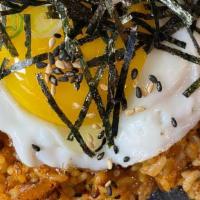 Kimchi Fried Rice (김치볶음밥) · Spicy. Korean rice, kimchi, onion, marinated pork, sunny-side-up egg