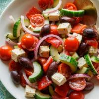Greek · Tomato, cucumber, olives, feta, red onion, chickpeas, croutons, balsamic vinergrette.