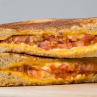 Grilled Cheese · Texas toast, American cheese, tomato.