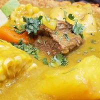 Sancocho Pequeño / Small Dominican Soup · Sopa de pollo con papas, zanahorias, batatas, pollo, carne de res y carne de cerdo. / Domini...