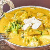 Vegetable Korma · Mix vegetables, creamy, almond and cashew nut sauce.
