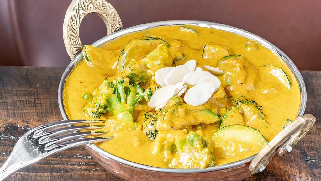 Vegetable Korma · Mix vegetables, creamy, almond and cashew nut sauce.