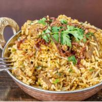 Lamb Biryani · Basmati rice simmered with lamb in mace and kewra and finished in a sealed vessel.