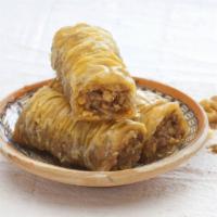 Traditional Baklava · Layered filo pastry filled with walnuts, honey and goodness.