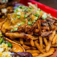 Bbq Fries · Fries with BBQ Seasoning, Pulled Pork or Brisket, Cheese, Scallions and Fatcho BBQ Sauce. Co...