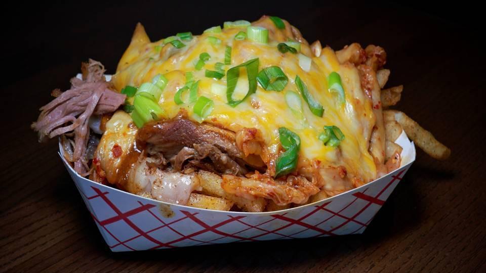 Cholander Fries · Loaded Fries with Kimchi, Pulled Pork, Fatcho Sauce, Cheese, Scallions. (If you do not want Kimchi, please order BBQ Fries)