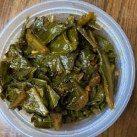 Mean Cho Greens · Southern Korean Collard Greens. Contains Pork and Beef.