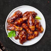 Bbq In The Air · Wings cooked and tossed in classic BBQ Sauce. Served with Ranch Sauce.