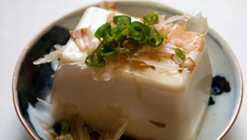 Yakko Tofu · Cold Japanese tofu with scallion and bonito sauce.