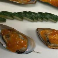 Baba Mussel · Grilled New Zealand Mussel with Curry sauce.