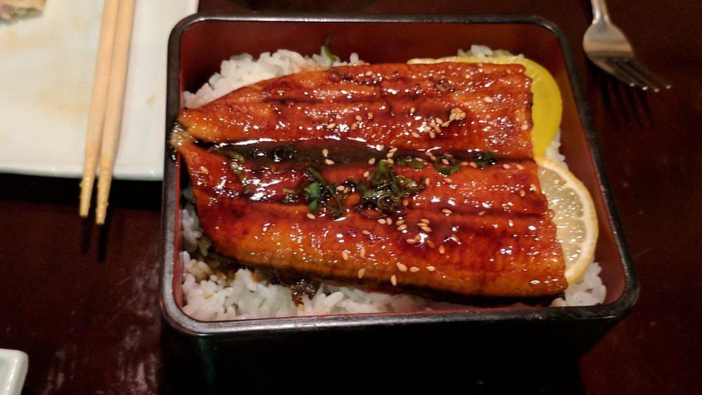 Unagi Don · Broiled eel topped with sauce over rice. Served with soup.