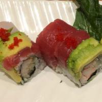 Rainbow Roll, 8 Pieces · Crab, cucumber, and masago, topped with assorted fish and avocado.